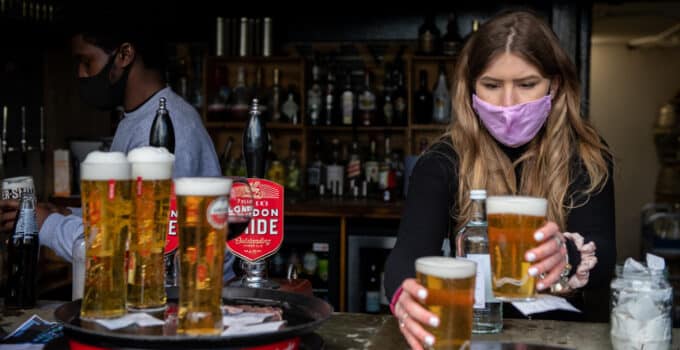 Bar Shows Off Technique to Block Drink Spiking, Sparking Debate