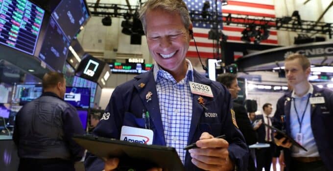 Stocks end higher, as defensives, tech shine