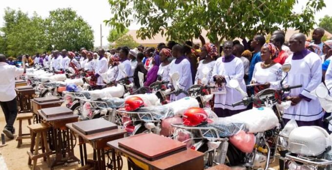 Catholic Diocese gives motorcycles to new catechists, wives get sewing machines