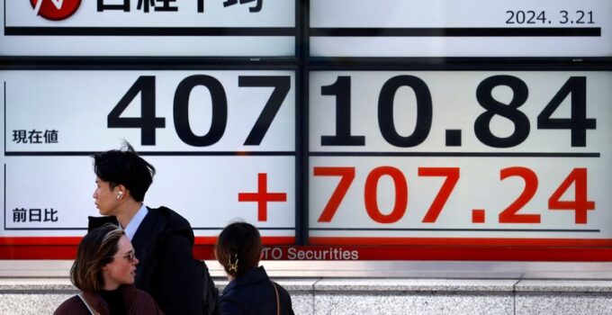 Global stocks gain on Big Tech lift; yen slides to 34-year low